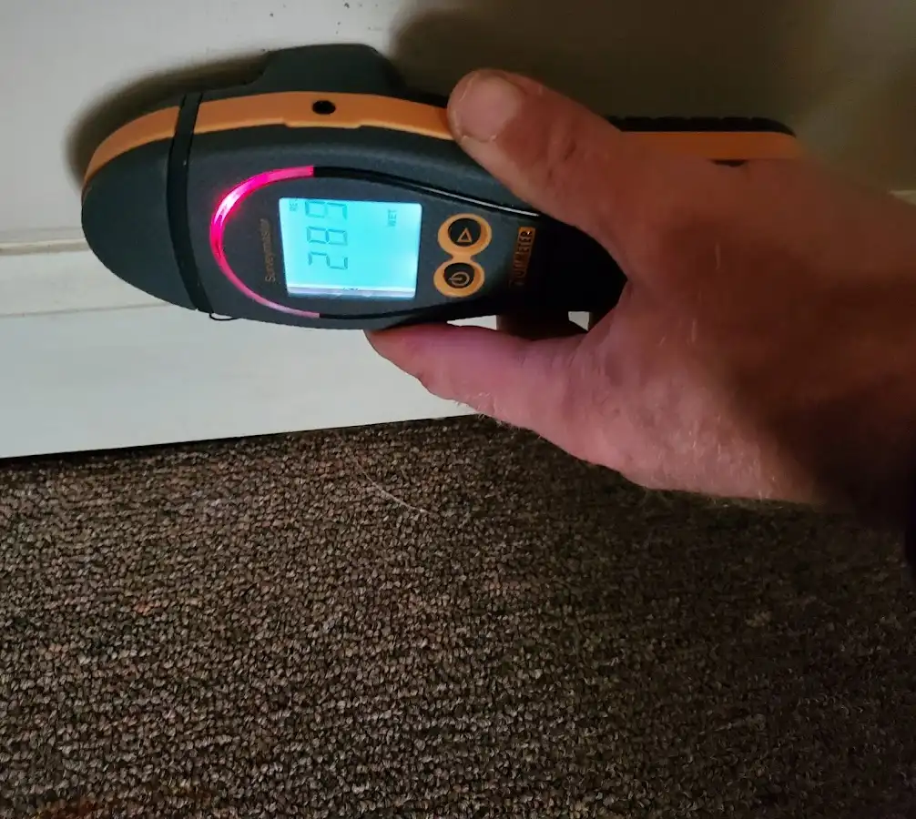 Moisture detection at baseboard during Sewage Cleanup & Sanitation in La Mirada